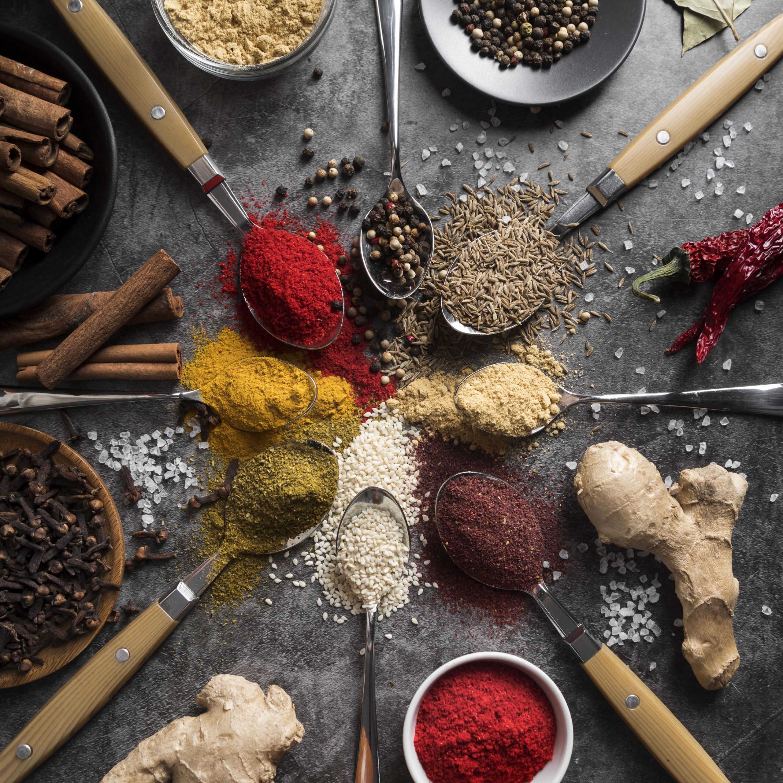 top-view-spoons-bowls-with-spices (1)